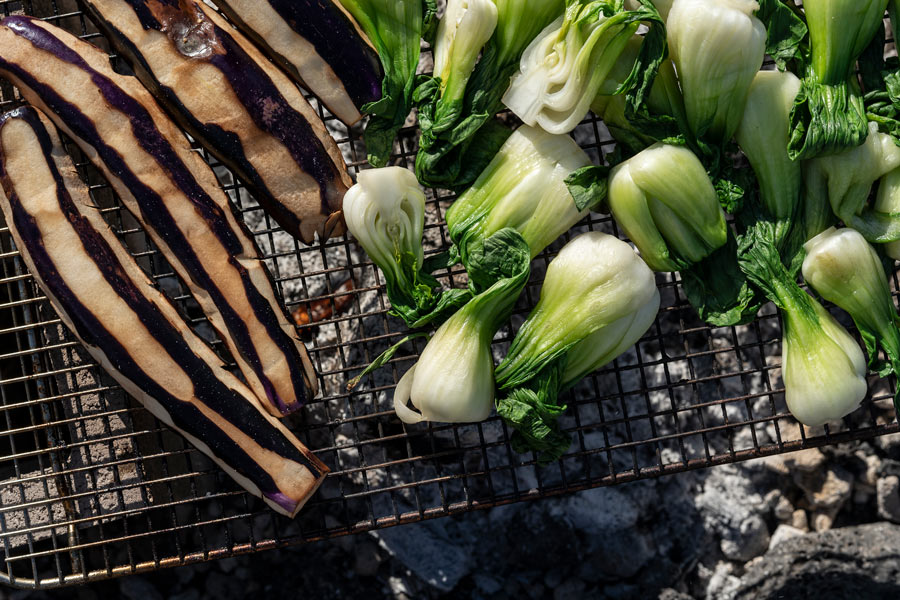 Vegetables Being Grilled on Open Fire