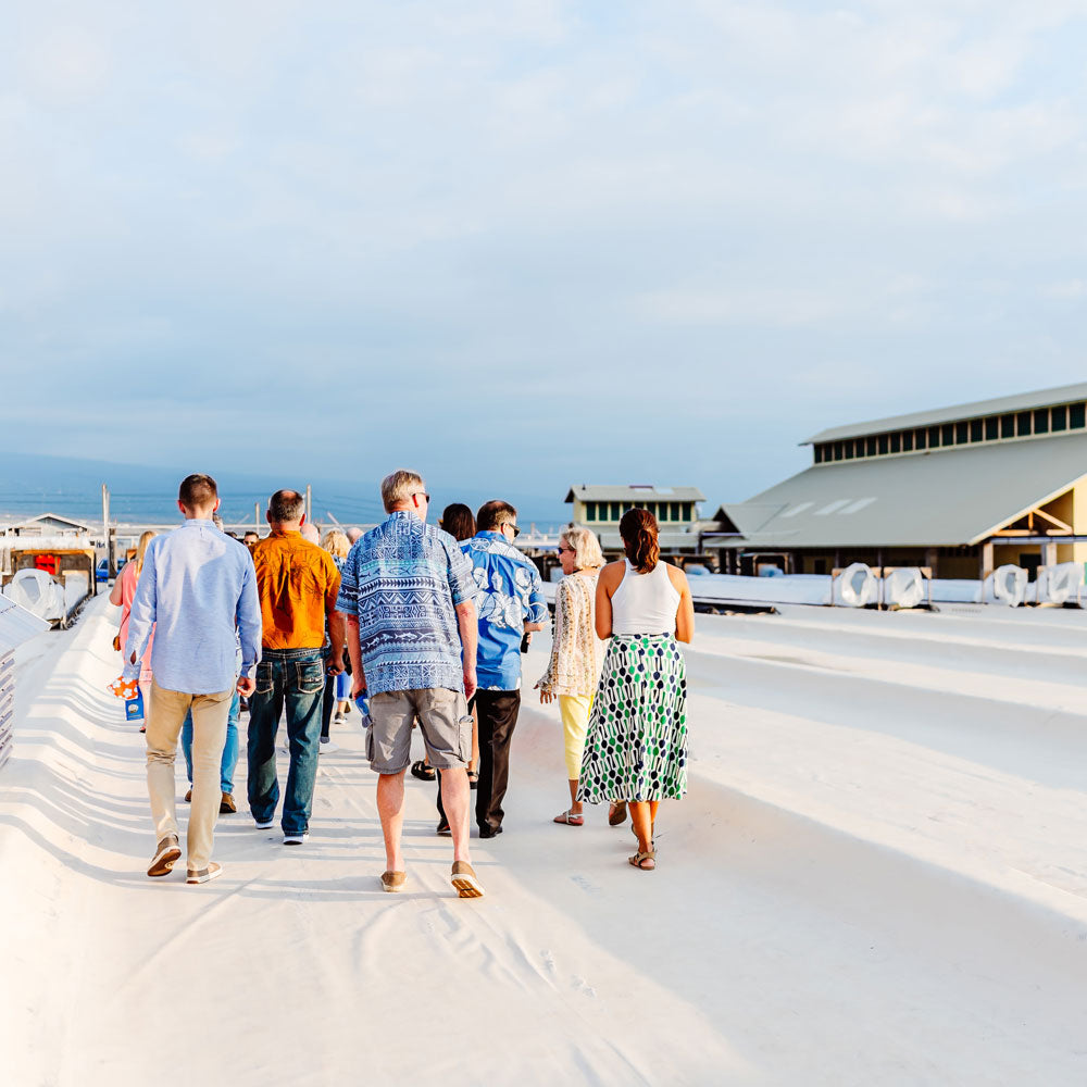 Tour Group Walking on Salt Deck