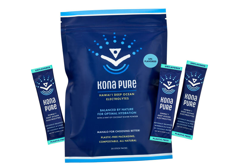Kona Pure electrolyte powder package with three individual packets on a white background