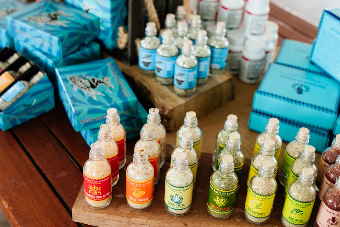 Assorted sea salts in glass bottles and signature blue gift boxes